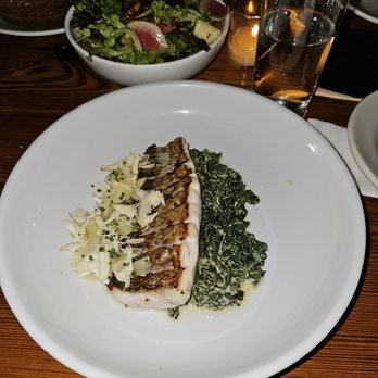 Sylvain - Striped bass with lump crab and creamed kale - Southern Near Me - New Orleans, Louisiana Sylvain - Striped bass with lump crab and creamed kale - Southern Near Me - New Orleans, Louisiana