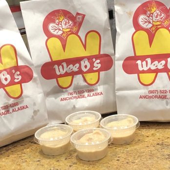 Wee B's - three bags of food on a counter - Burgers Near Me - Anchorage, Alaska