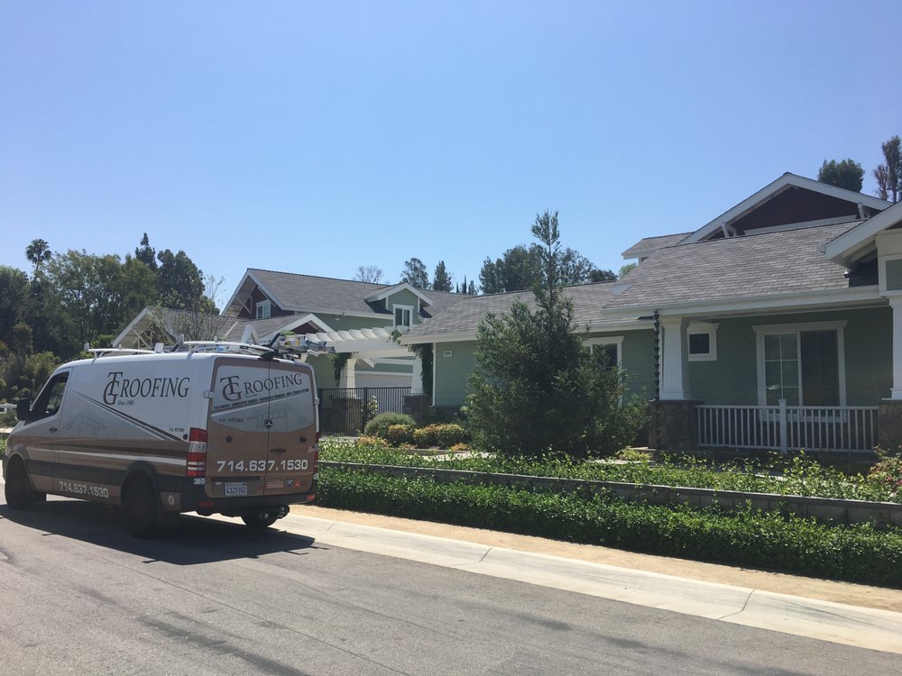 Slide of TG Roofing and Roof Removal