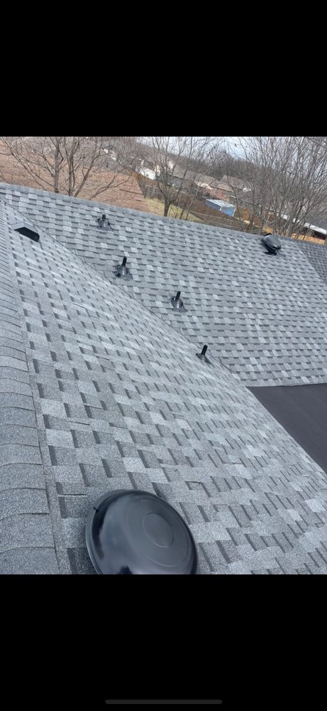 Slide of Top Dawg Roofing