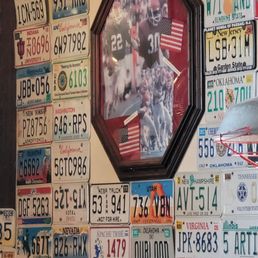 a wall of license plates