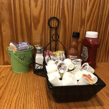 Grand Day Cafe - table fully equipped with condiments - Breakfast & Brunch Near Me - Columbus, Ohio Grand Day Cafe - table fully equipped with condiments - Breakfast & Brunch Near Me - Columbus, Ohio