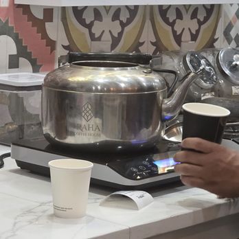 Raha Coffehouse - Chai brewing - Coffee & Tea Near Me - Buffalo, New York Raha Coffehouse - Chai brewing - Coffee & Tea Near Me - Buffalo, New York