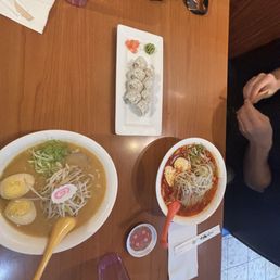 Kimchi ramen (red), miso ramen and a California roll. Kimchi ramen (red), miso ramen and a California roll.