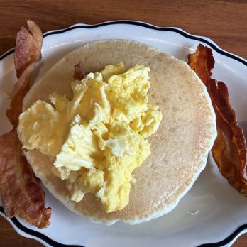 Anna Miller's - Pancakes with scrambled eggs and bacon, no butter - Bakeries Near Me - Aiea, Hawaii Anna Miller's - Pancakes with scrambled eggs and bacon, no butter - Bakeries Near Me - Aiea, Hawaii