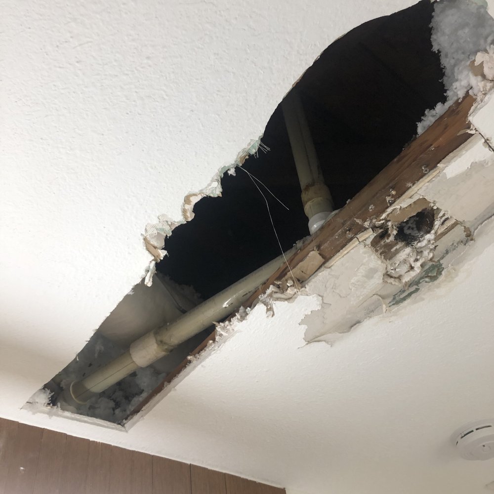 That 1 Painter Dallas - Before - the hole left by the plumber to repair the burst pipe - Painters Near Me - Richardson, Texas That 1 Painter Dallas - Before - the hole left by the plumber to repair the burst pipe - Painters Near Me - Richardson, Texas