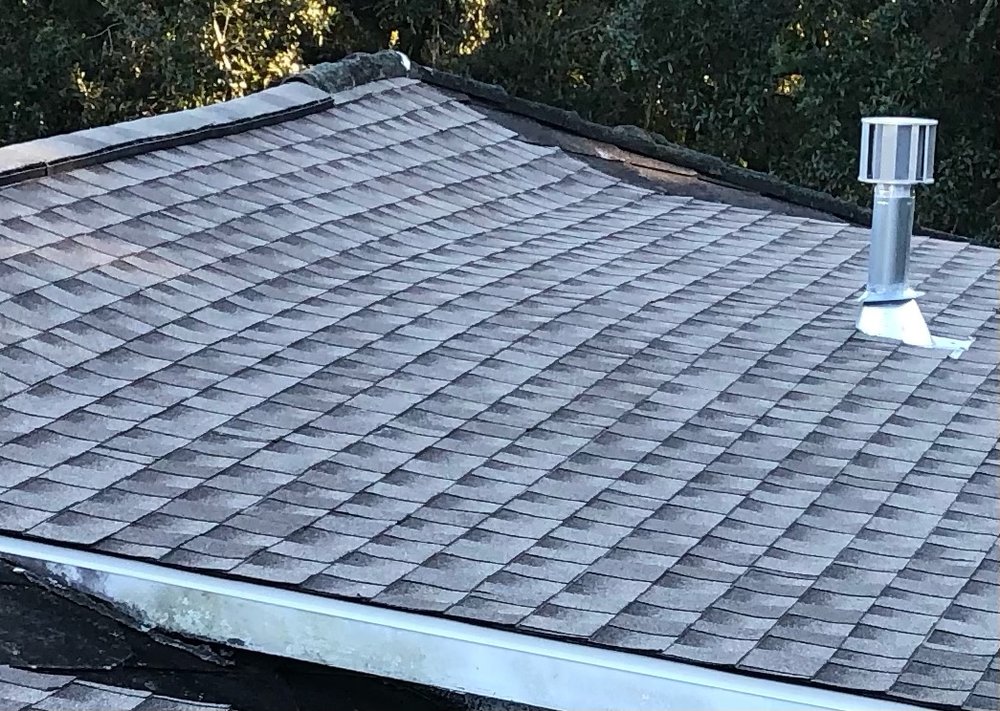 Slide of Restoration Roofing KE