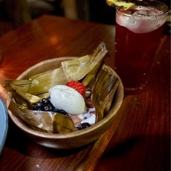 Primo - Strawberry and hibiscus tamal, vanilla ice cream, berry preserves. Paired with a tequila hibiscus cocktail.