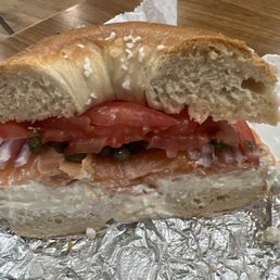Salt Bagel with cream cheese, lox, red onion, caper and tomatoes. Salt Bagel with cream cheese, lox, red onion, caper and tomatoes.