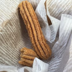 Besame Mucho - Best churro ever (my boy's review). The coffee is out of this world.