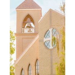 Our Lady of the Assumption Catholic Church - Church bell and cross side view