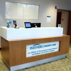 Mass General Brigham Urgent Care - The check in counter at Partners Urgent Care in Newton, MA.