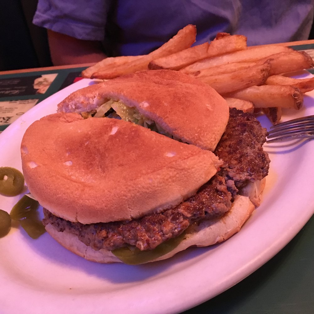 Monster cheeseburger with jalapeños.
