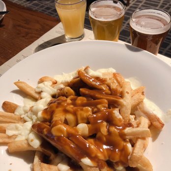Amsterdam BrewHouse - Poutine and their seasonal flight - Breweries Near Me - Toronto, Ontario