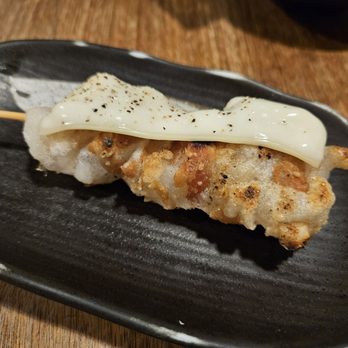 Zakkushi On Carlton - Cheese Mochi Maki - 1 skewer $4.5 (Sticky rice wrapped in sliced pork w/Melted cheese on top) - Japanese Near Me - Toronto, Ontario Zakkushi On Carlton - Cheese Mochi Maki - 1 skewer $4.5 (Sticky rice wrapped in sliced pork w/Melted cheese on top) - Japanese Near Me - Toronto, Ontario