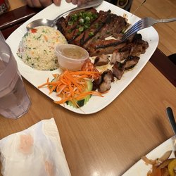 Pho Quan Vietnamese Cuisine - The pork chop platter! Uncle Sam who likes nothing different loved this!!