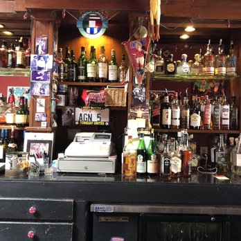 The Press Room - a bar with bottles of alcohol - Sports Bars Near Me - Santa Barbara, California