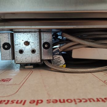A-1 Pro Appliance Installation - the mess of tubing left by Jessie and his workers with the drain pan thrown in between - Appliances & Repair Near Me