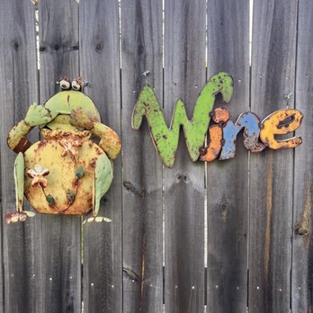 Froggy Wines - the word wine on a fence - Wineries Near Me - Huntsville, Texas