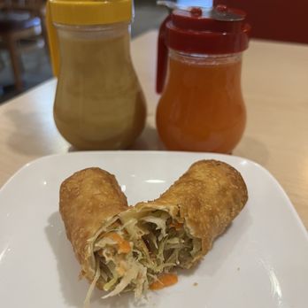 Noodle & Sushi Delight - Inside the egg roll. In-house made plum sauce and hot mustard! - Chinese Near Me - Roselle, Illinois