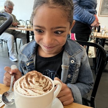 Tea Room Cafe - My daughter admiring her first Tea Room hot coco. - Coffee & Tea Near Me - Petaluma, California