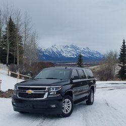Teton Limousine Services - Black on black brand new Suburban