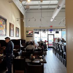 Booths to the very left and tables in the middle