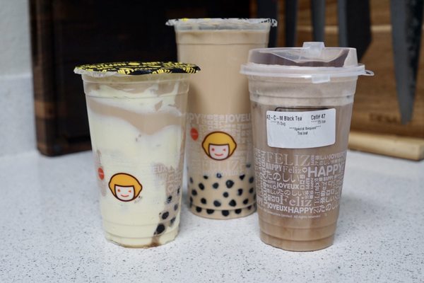 Photo of Happy Lemon - Pleasanton, CA, US. Boba Milk Tea with Puff Cream (left), Boba Milk Tea (middle), and Black Tea with Tiramisu Salted Cheese (right)