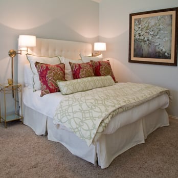 designTEN1 Interiors - a bedroom with a bed and two lamps - Interior Design Near Me - Amarillo, Texas designTEN1 Interiors - a bedroom with a bed and two lamps - Interior Design Near Me - Amarillo, Texas