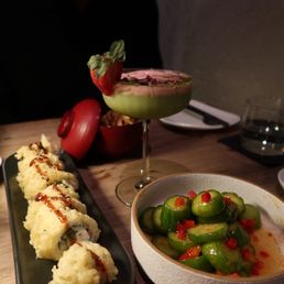 Sushi, cucumber salad, matcha martini