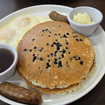 French Toast Cafe - Blueberry pancakes with over easy eggs and sausage links - Breakfast & Brunch Near Me - Mesa, Arizona