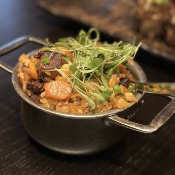Stripsteak - Side dish - Spicy Pork Belly Fried Rice - Steakhouses Near Me - Las Vegas, Nevada Stripsteak - Side dish - Spicy Pork Belly Fried Rice - Steakhouses Near Me - Las Vegas, Nevada