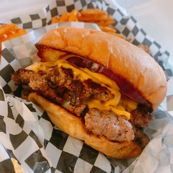 The Stonehouse Wood Fire Grill - a hot dog and fries - Food Trucks Near Me - Austin, Texas The Stonehouse Wood Fire Grill - a hot dog and fries - Food Trucks Near Me - Austin, Texas
