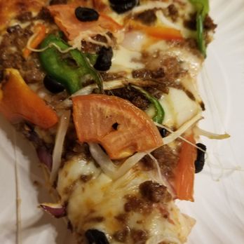 Jaffrey Pizza Barn - a slice of pizza on a paper plate - Pizza Near Me - Jaffrey, New Hampshire