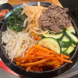 Beef bulgogi Korean stone bowl Beef bulgogi Korean stone bowl