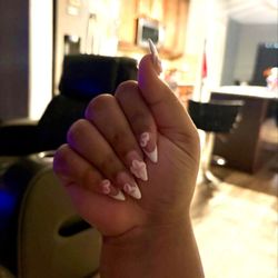 T C Nail - The shape, design, and attention to detail are amazing. Super sweet, professional, and talented. Definitely coming back!