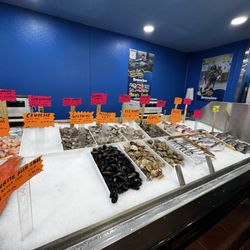 Branzino Fish Market - Fresh seafood selection.
