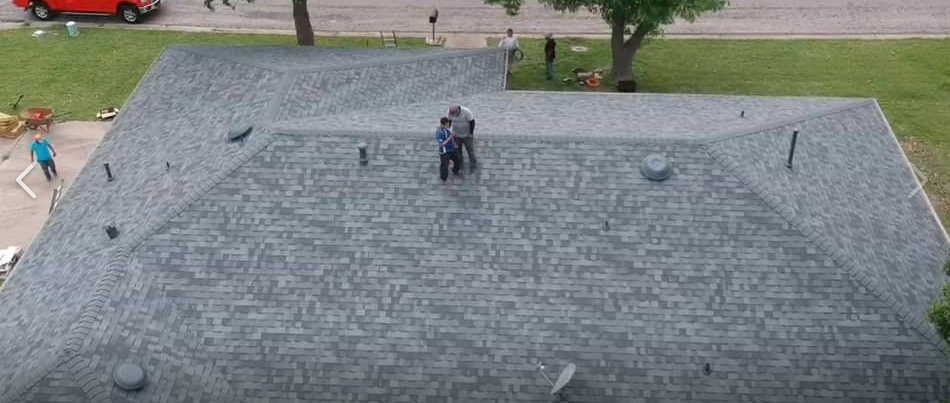 Slide of IronHouse Roofing