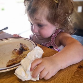 Denver Biscuit Co. - Centennial - Grandbaby helping us eat all the cinnamon roll! - Breakfast & Brunch Near Me - Centennial, Colorado