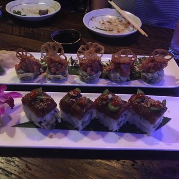 Tiki Rock - Lotus Flower Roll and Yiji Roll - Tiki Bars Near Me - Boston, Massachusetts Tiki Rock - Lotus Flower Roll and Yiji Roll - Tiki Bars Near Me - Boston, Massachusetts