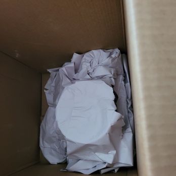 Prosperity Moving - Plates wrapped in torn paper - Movers Near Me - Elk Grove, California