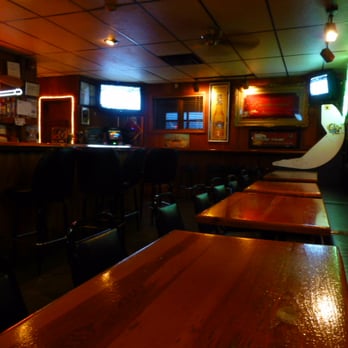 Towne Tap - a row of tables and chairs - Bars Near Me - Warrenville, Illinois