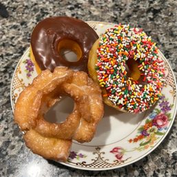 Sour Cream, Chocolate Glazed and Chocolate glazed with sprinkles.