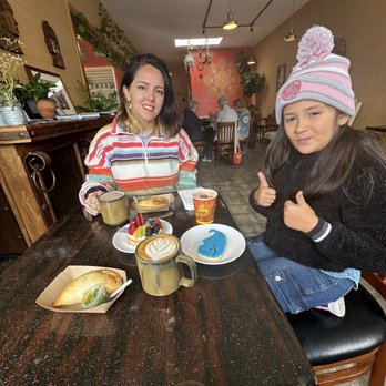 Cafe Guarani - i had the brisket empanada and a Mate "Latte", daughter had a whale cookie and we all shared a fruit tart - Cafes Near Me - Pacific Grove, California
