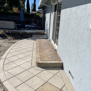 Lara's Concrete - Extended backyard walkway. - Masonry/Concrete Near Me