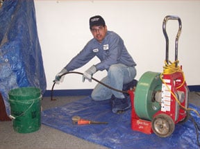 Slide of Suburban Sewer & Septic