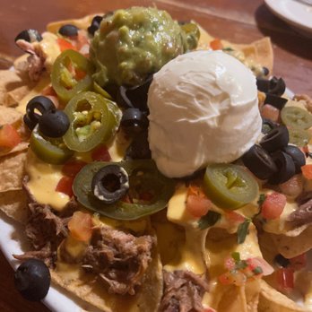 Carlos & Harley's - Nachos with added queso - Mexican Near Me - Eden, Utah Carlos & Harley's - Nachos with added queso - Mexican Near Me - Eden, Utah