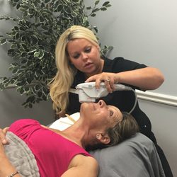 Skin Specialists - Natalie performing an Ultherapy treatment.
