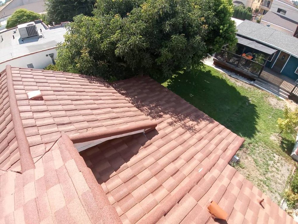 Slide of Reno's Roofing