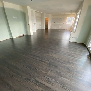 Summit Wood Floors - a hardwood floor in an empty room - Flooring Near Me Summit Wood Floors - a hardwood floor in an empty room - Flooring Near Me
